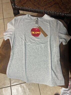 SKIMS Light Gray Tee with NYC Red Apple Logo